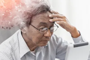 Assistenza OSS per malati di Alzheimer OSS che assiste un paziente con Alzheimer nelle attività quotidiane